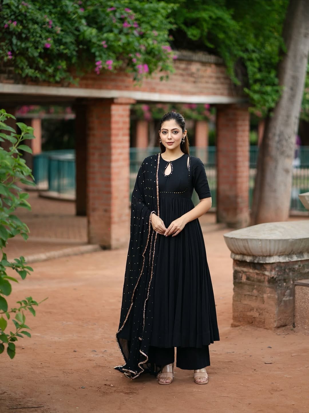 Beautiful Black shade blush  cotton  suit embellished with embroidery on the dupatta.